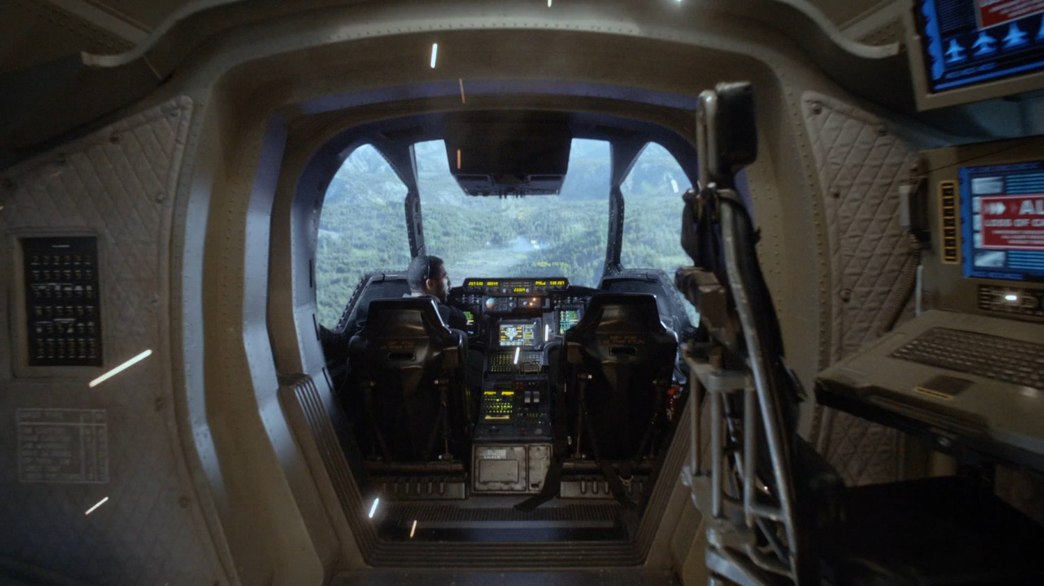 Interior of Quinjet looking into West Virginia forest.