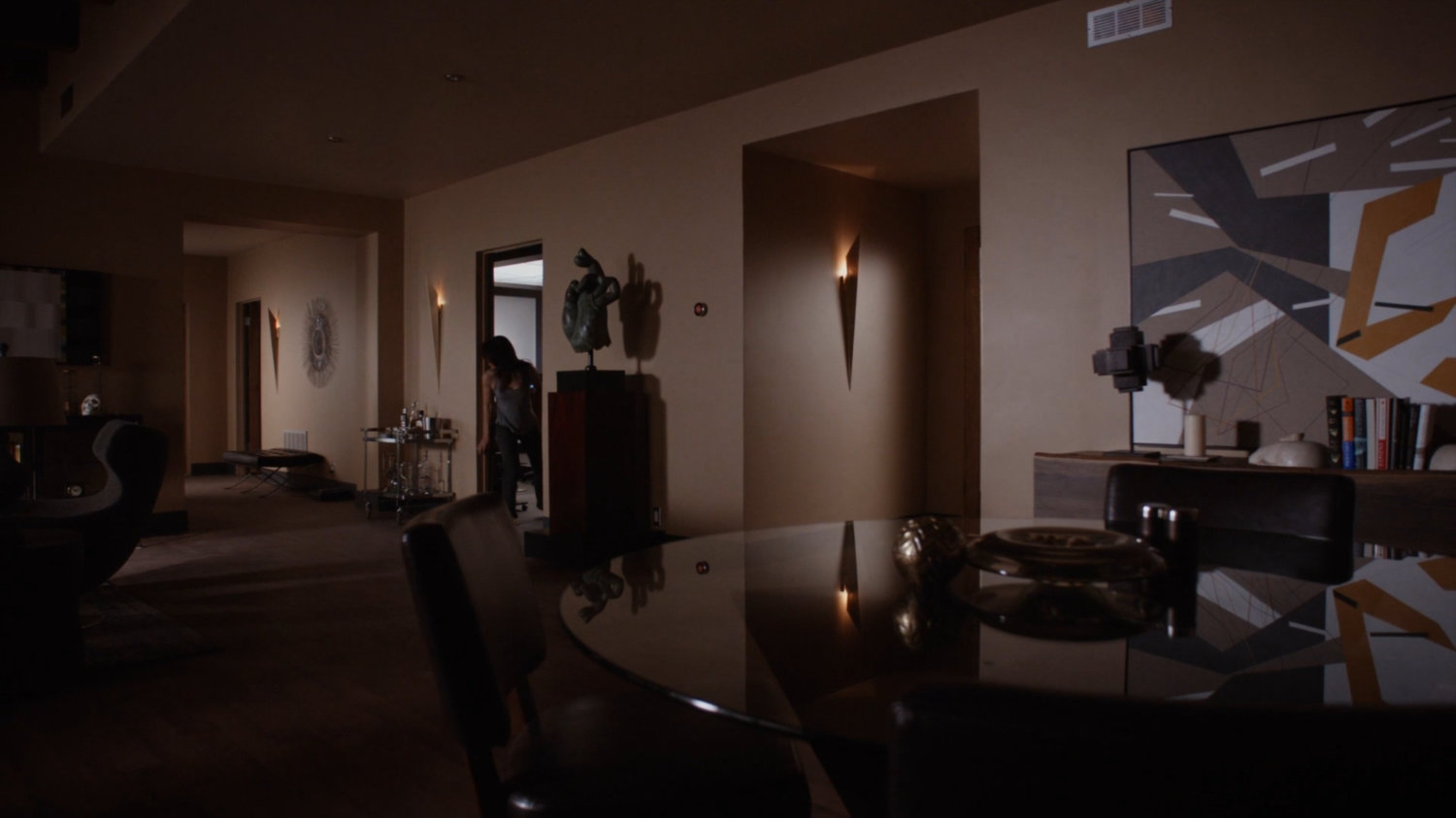 Agent May sneaks into a framework version of Radcliffe's family room.