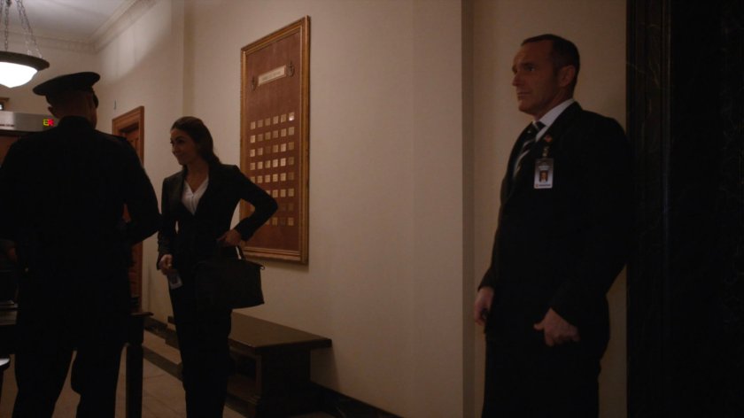 Coulson and Yo-Yo in a Senate hallway.