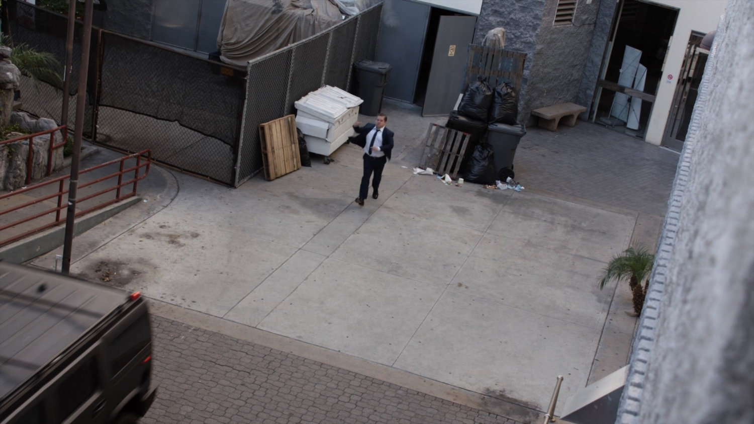 Sam Koenig in alley outside Al & Cam's Arcade.