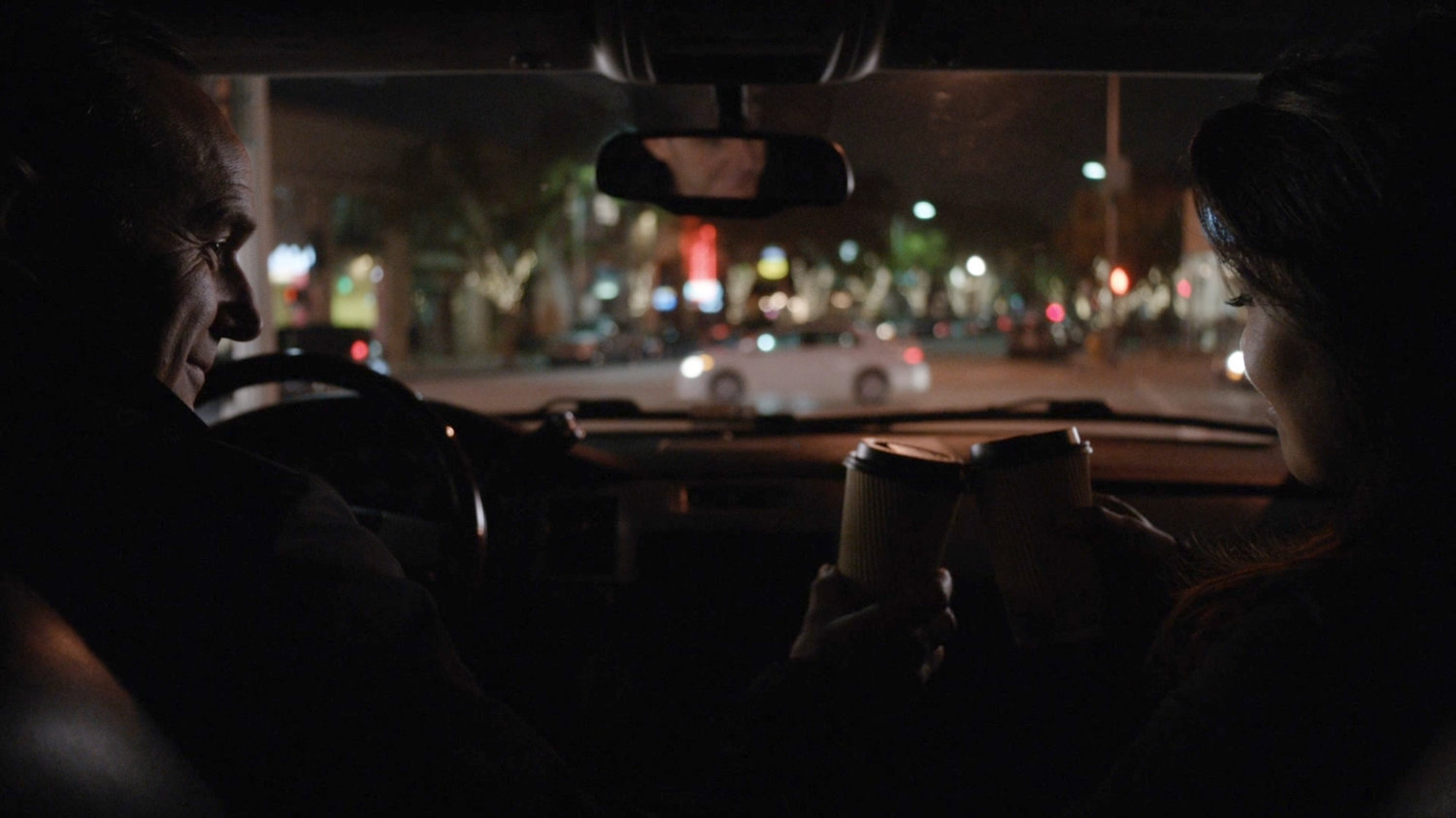 Coulson and May toasting in car outside the Soul Patch.