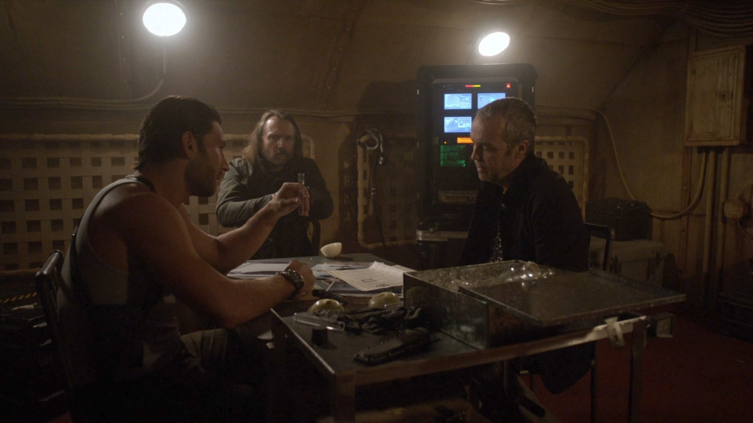 Anton Ivanov, Shockley, and Radcliffe in Ivanov's submarine.