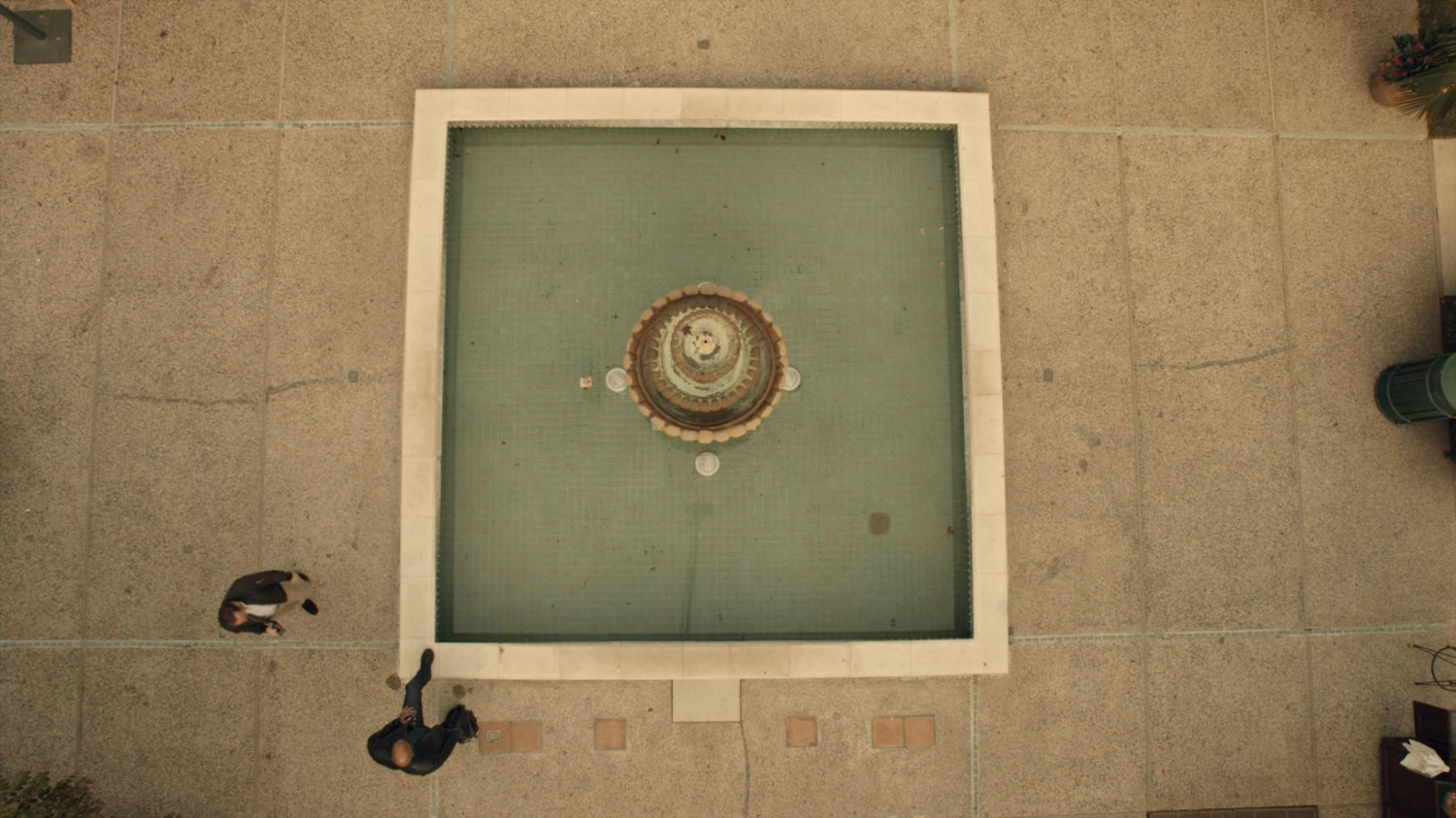 High angle view of fountain in Spanish plaza.