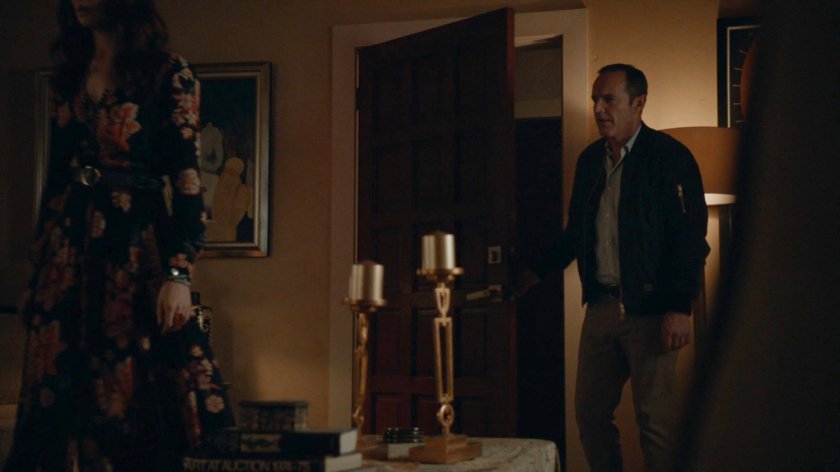 Coulson entering Agnes's apartment.