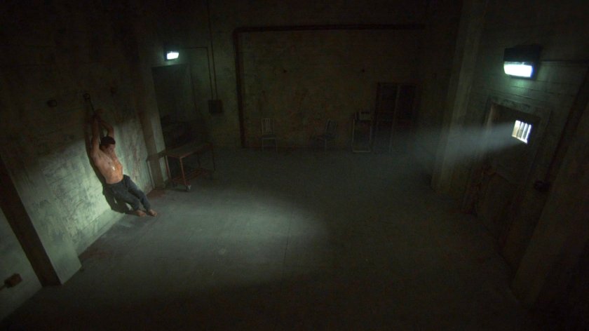 Jeffrey Mace chained up in old SVR base cell.