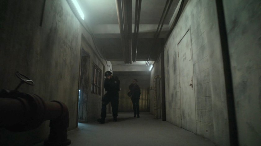 SHIELD Agents in hallway of old SVR base.