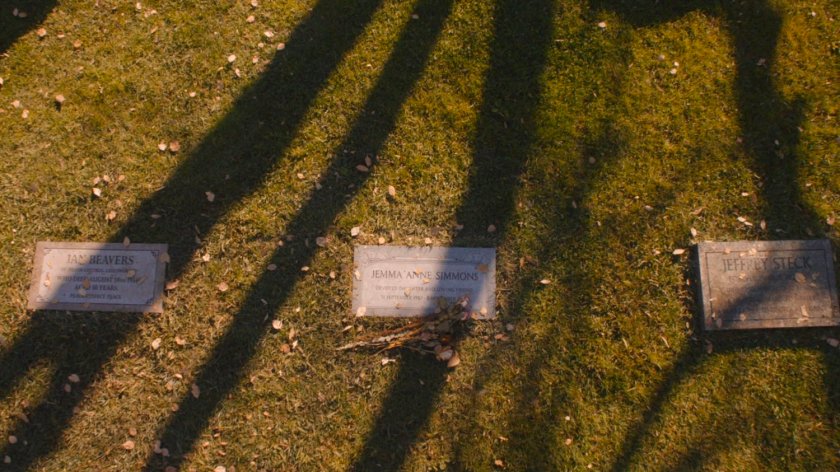 High angle view on headstones in a Framework cemetery, including one for Jemma Anne Simmons.