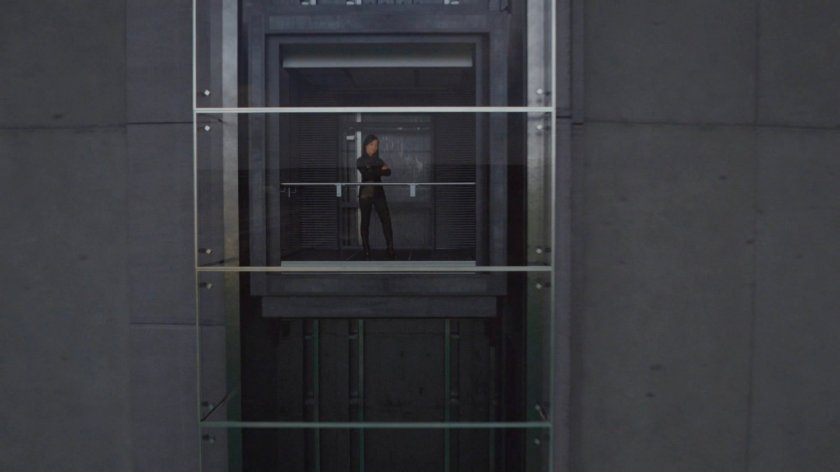 May in an elevator at the Framework version of the Triskelion.