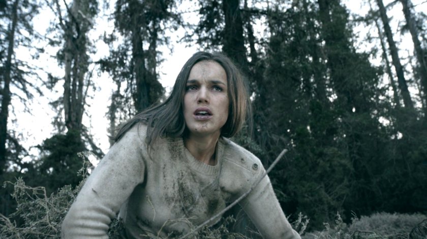 Simmons rises from a mass grave on the SHIELD academy grounds in the Framework.