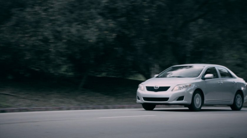A car driving along a Washington DC road in the Framework.