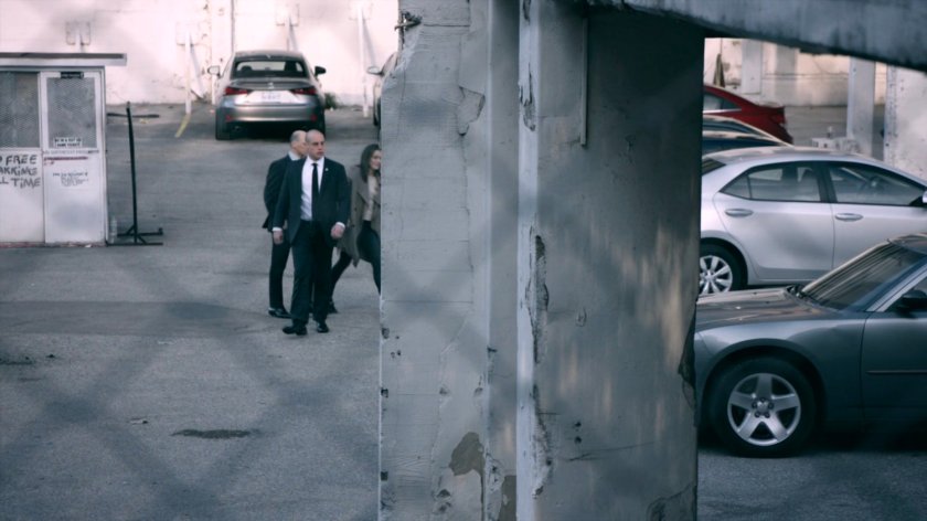 HYDRA Agents Pinksy and Slate in a parking lot with Jemma in the Framework.