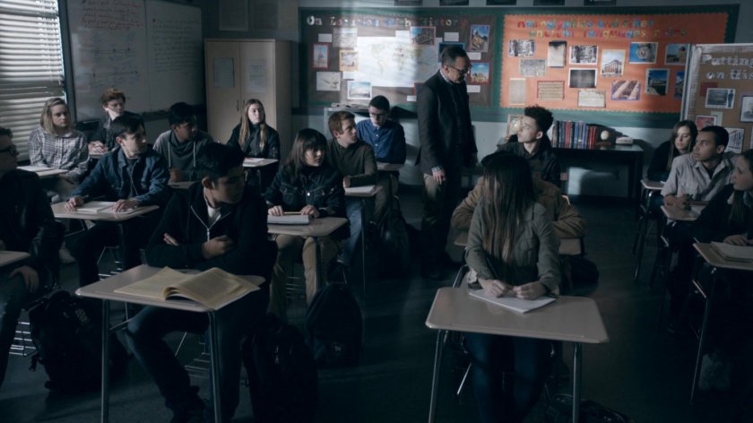 Coulson teaching students in a classroom in the Framework.