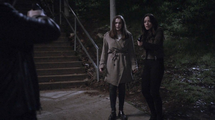 Daisy and Simmons held at gunpoint in a park at night in the Framework.