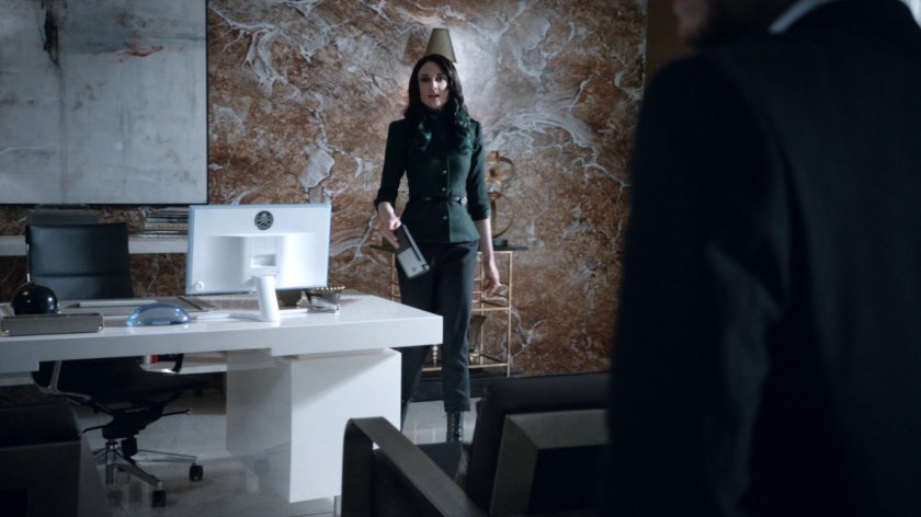 Madame Hydra in her apartment in the Framework.
