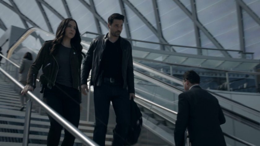 Ward and Daisy descend the stairs in the Framework Triskelion.