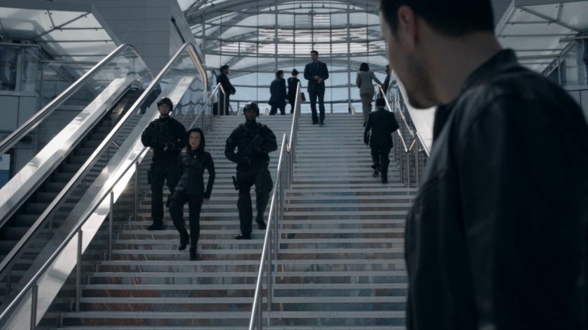 May and guards on the stairs in the Framework Triskelion.