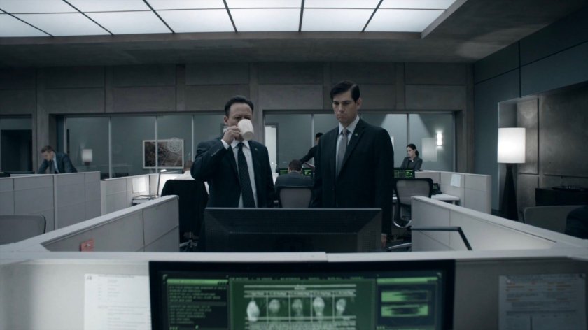 Two agents in the bullpen of the Framework Triskelion.