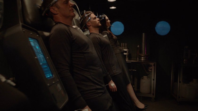 Coulson, Fitz, and Aida plugged into the Framework in the Superior's base.