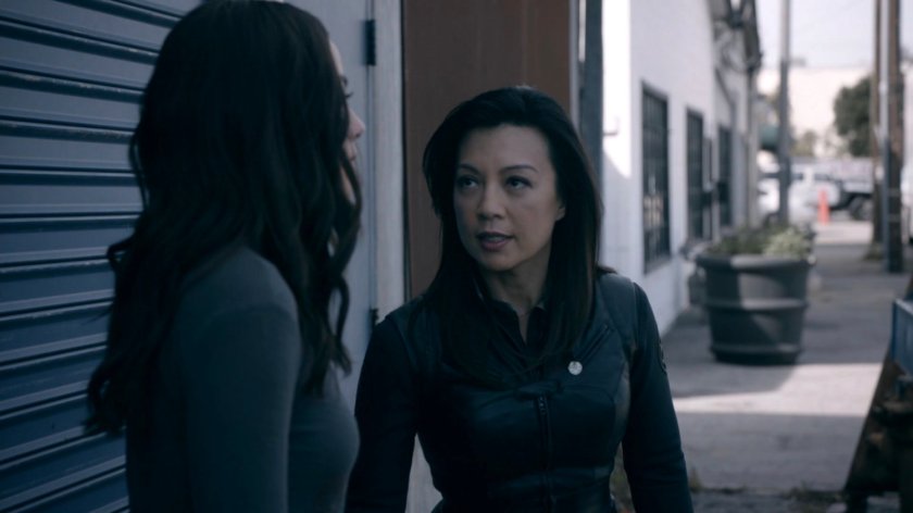 May and Daisy sneaking on a sidewalk in the Framework.