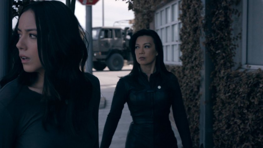 May and Daisy sneaking on a sidewalk in the Framework.