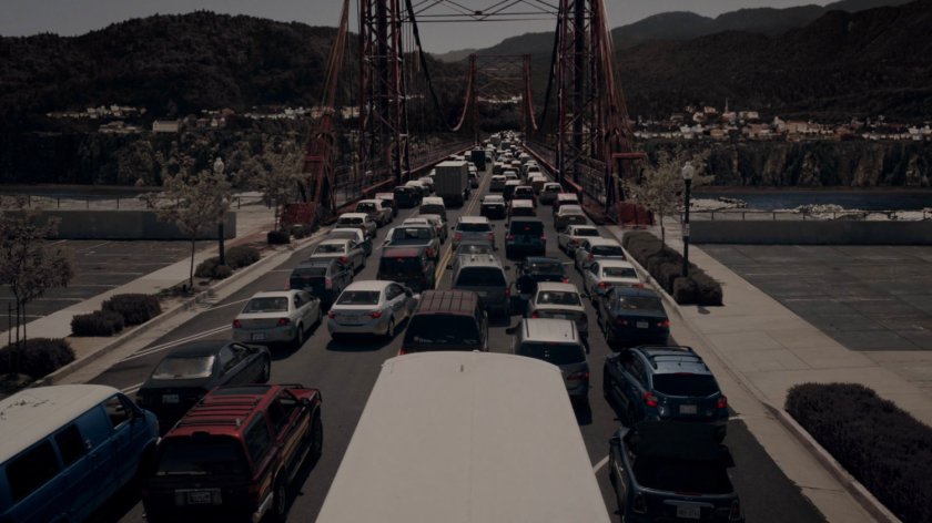 Traffic on a bridge out of town in the Framework.