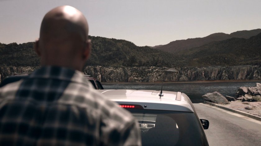 Mack looking at a river where there used to be a bridge in the Framework.