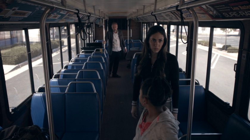 Radcliffe, Yo-Yo and Hope on a midtown transit bus stuck in traffic in the Framework.