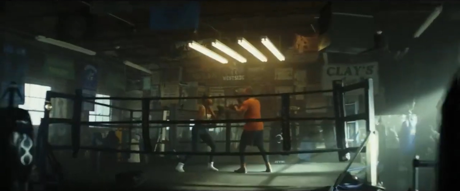 Sam and Leila sparring in Clay's Gym.