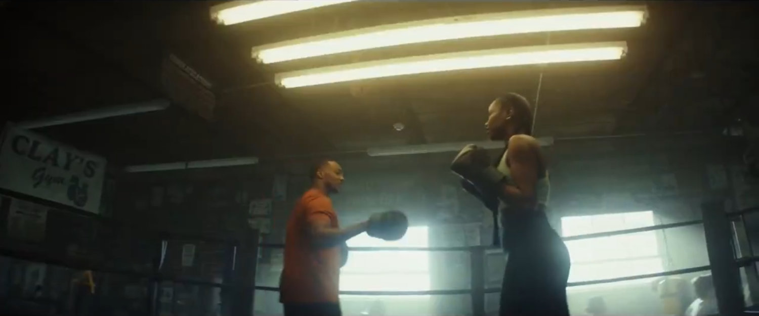 Sam and Leila sparring in Clay's Gym.
