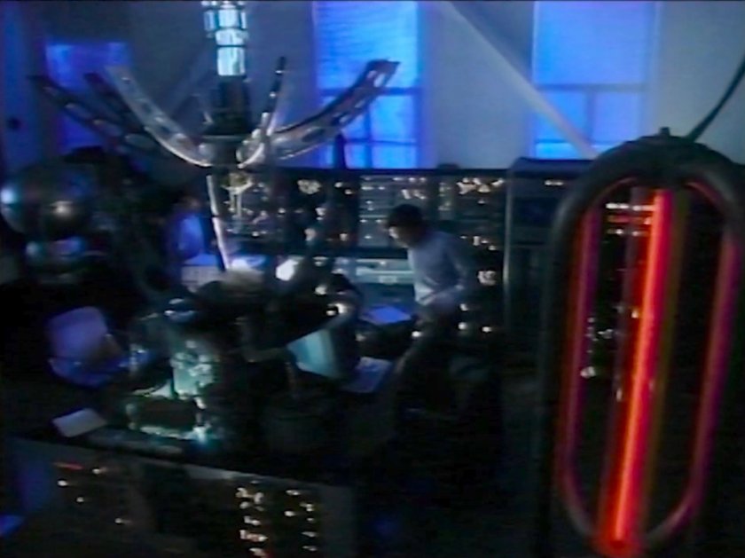 Reed and Victor in a dark college lab.