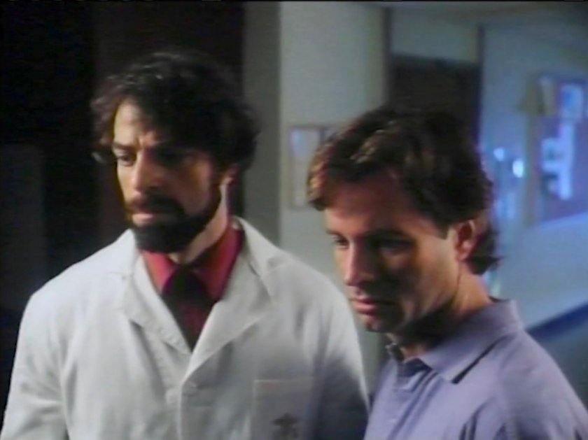 Reed and Kragstadt in a hospital hallway.