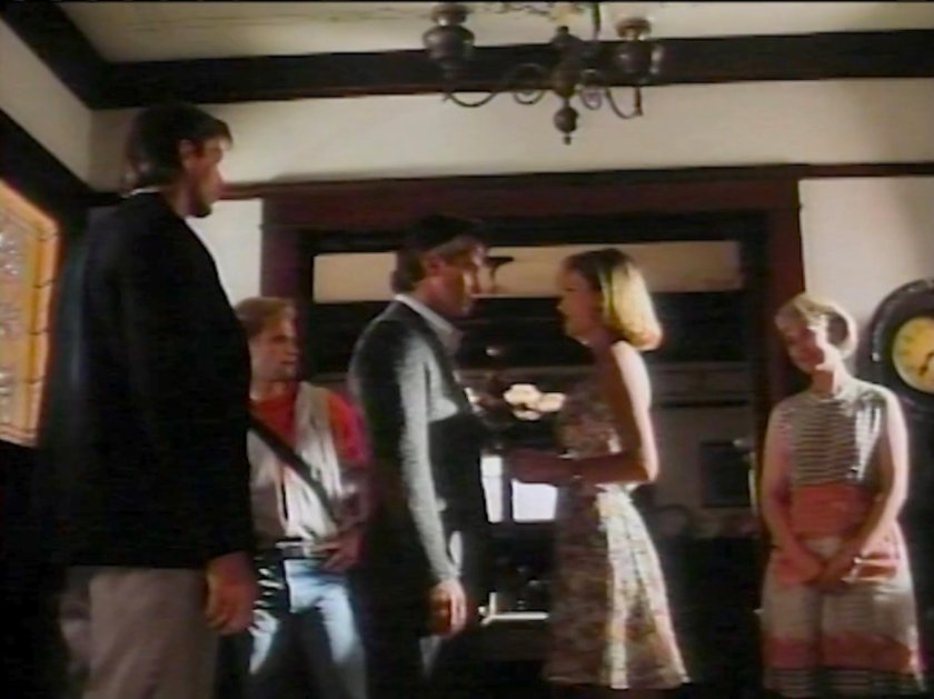 Johnny, Ben, Sue, and Reed in the foyer of Mrs Storm's Boarding House.