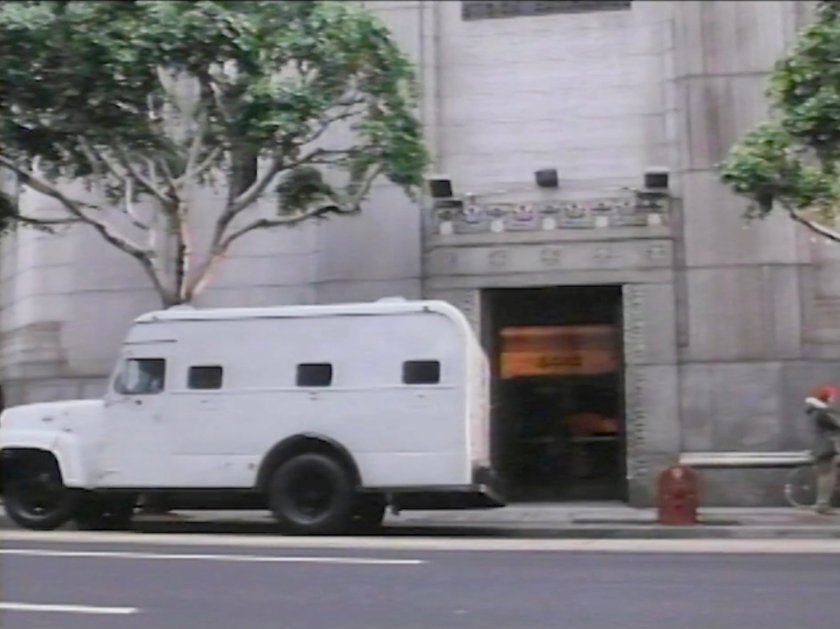 Armored car in front of the Baxter Building.