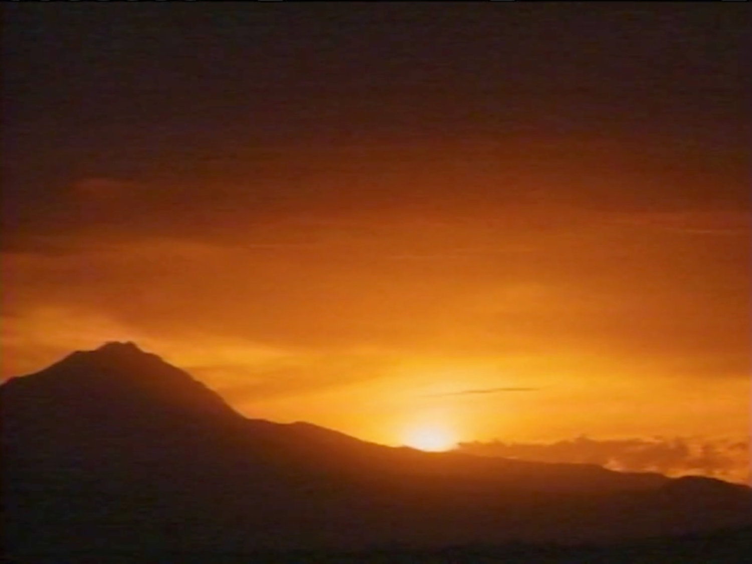 Sunset behind a hill.