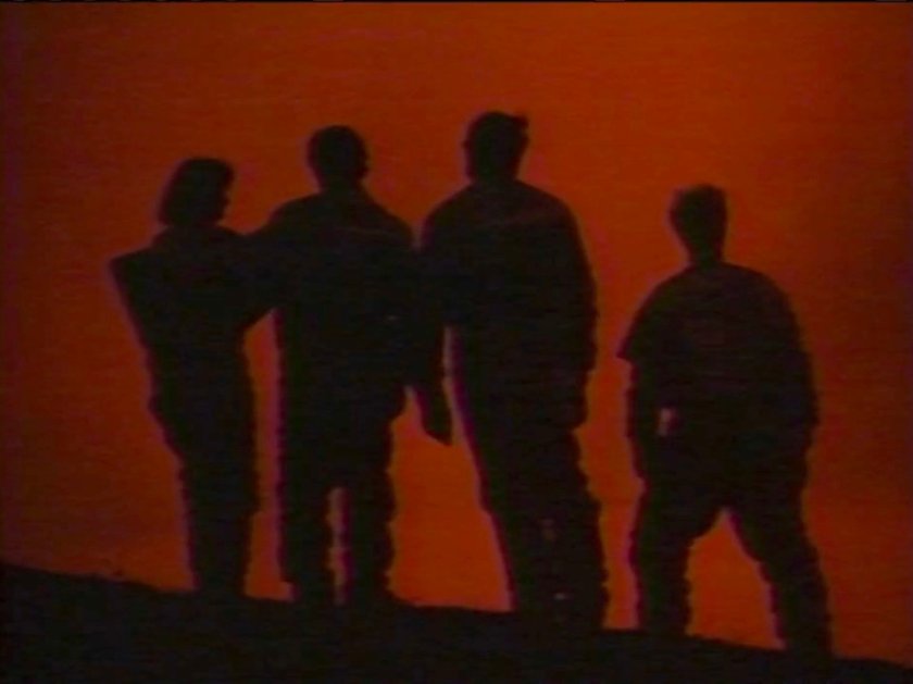 The Fantastic Four silhouetted by the sunset.