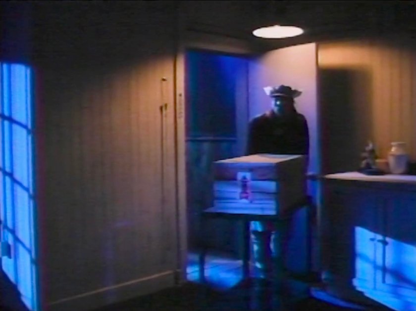 Delivery driver entering Alicia's loft.