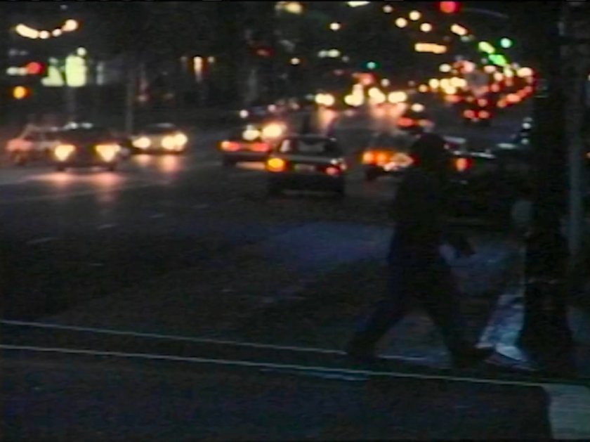 The Thing crossing a street at nighttime.