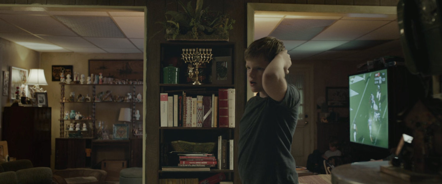 Young Ben in his house.