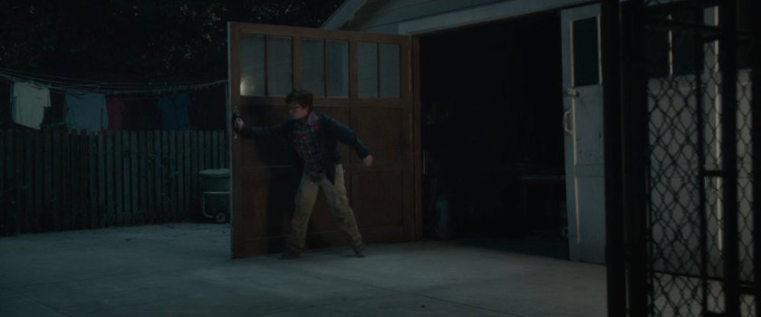 Young Ben and Reed outside of the Richards' garage.