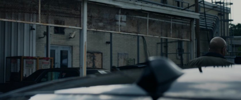 Franklin Storm outside Victor's warehouse.