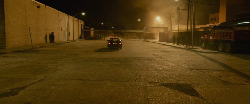 Johnny's car stalling in a parking lot.