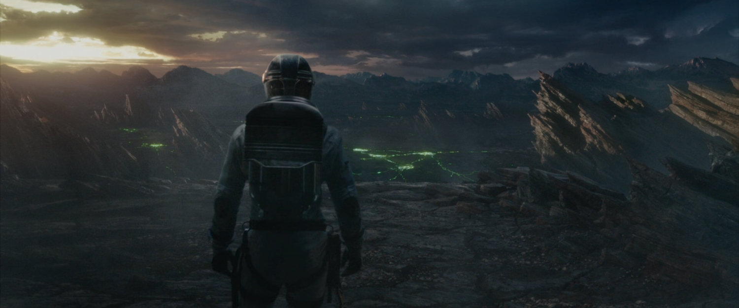 Victor looking out over a plateau on Planet Zero.