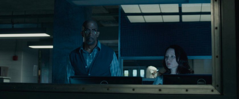 Franklin in a control room at Area 57.