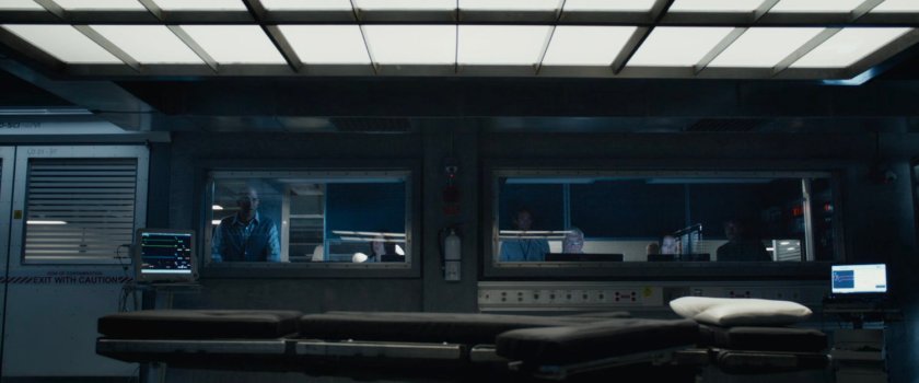 Franklin looking into a lab room at Area 57.