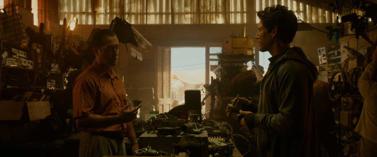 Reed, in disguise, in a South American junk shop.