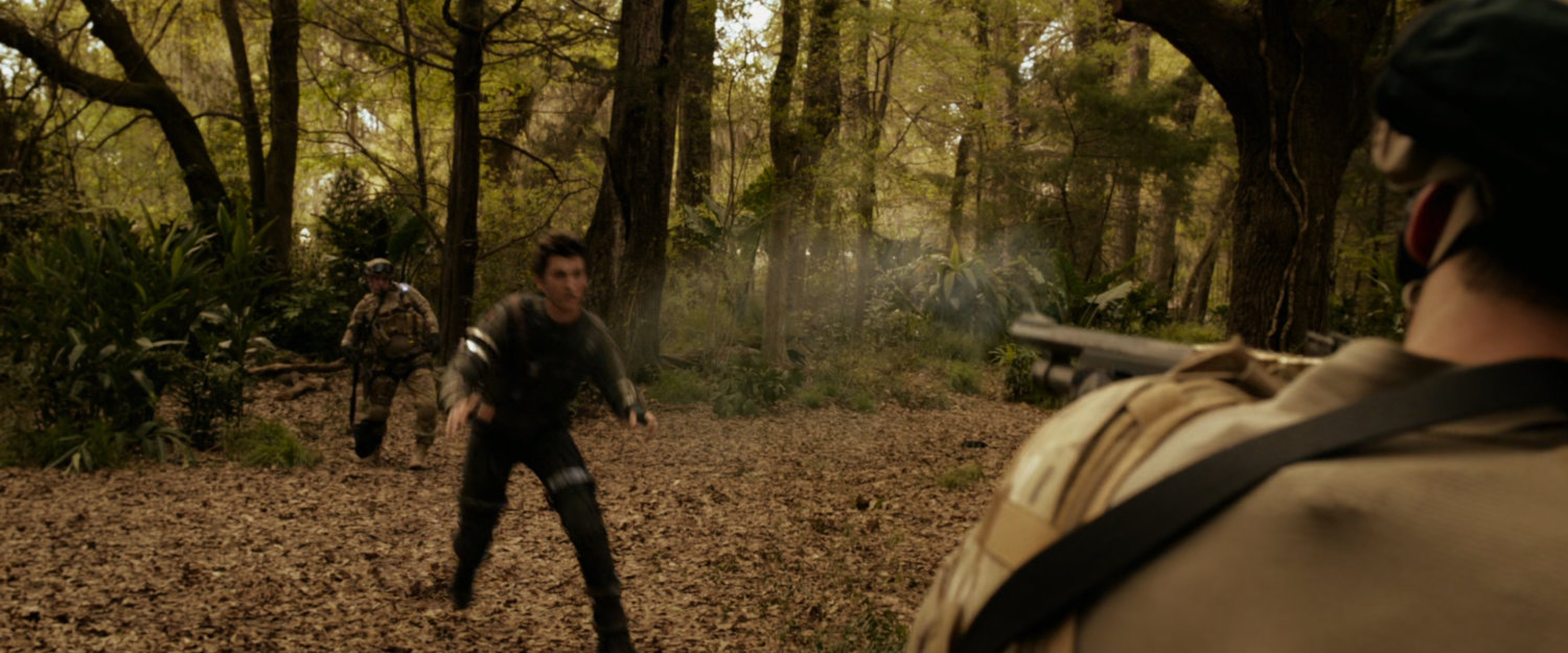 Reed and soldiers in a South American jungle.