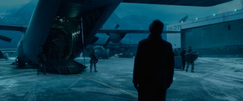 People disembarking a cargo plane at Area 57.