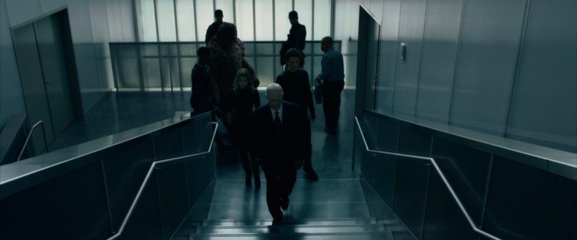 Reed, Sue, Johnny, and Ben walking up stairs in the Entrance to the Central City think tank.