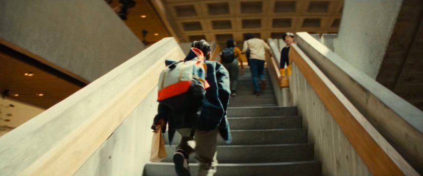 Riri walking up stair sin MIT building.