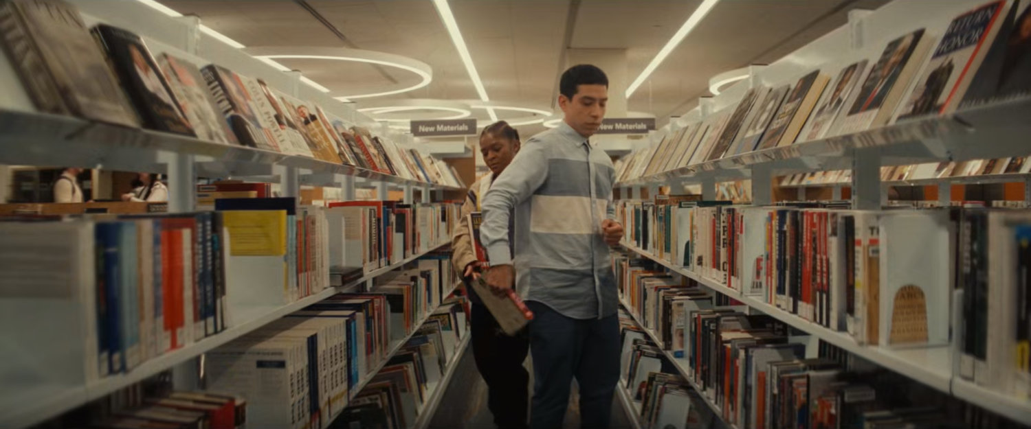 Riri and a student in the MIT library.